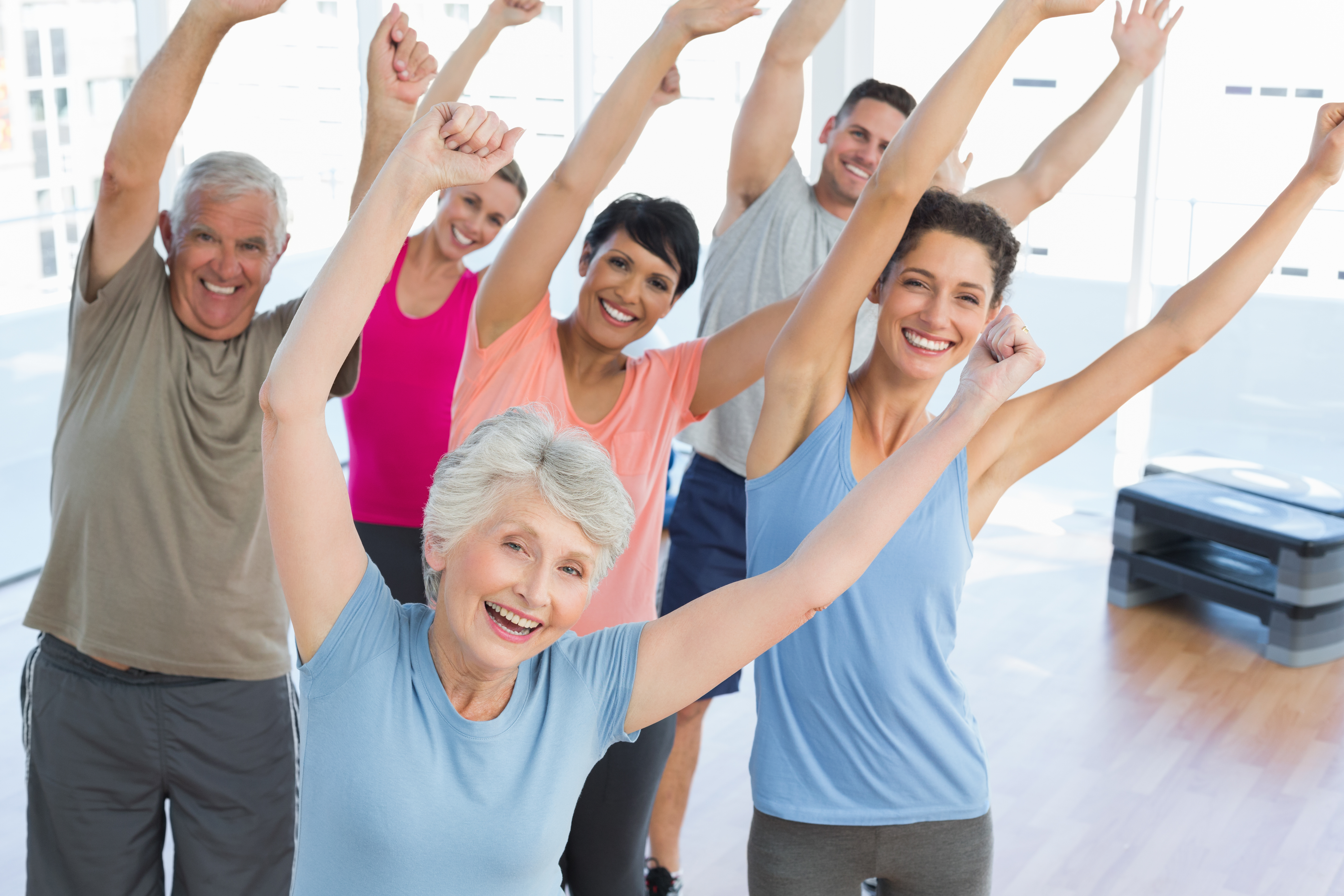older adults enjoying stretching routine