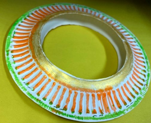 Ring-shaped flying disc made out of two paper plates