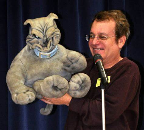 ventriloquist with a hand puppet