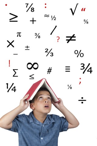 Boy under math book and numbers/symbols over him