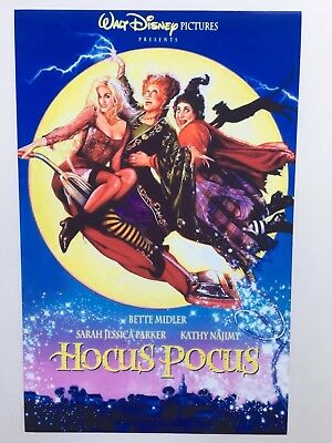 Movie poster for Hocus Pocus with three witches flying on a broomstick in front of the moon.