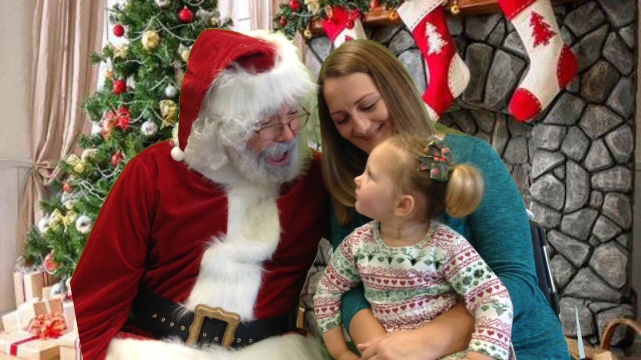 Photo of Santa with mother and daughter