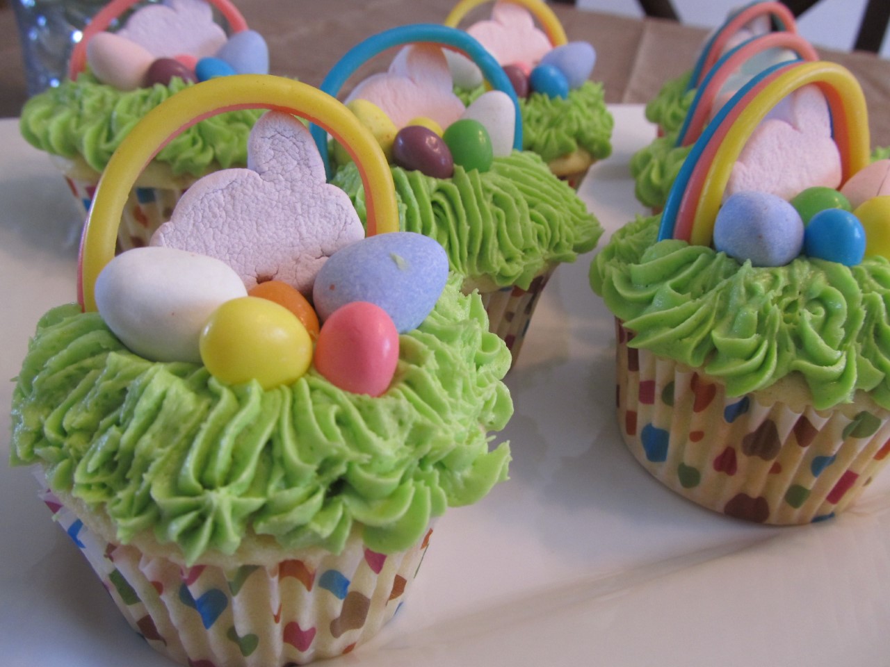 Cupcakes decorated with grass icing and rabbits