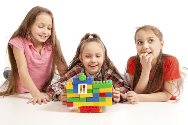 Girls building a tower