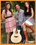 Photo of guitarist Fred Benedetti with his daughters Regina and Julia