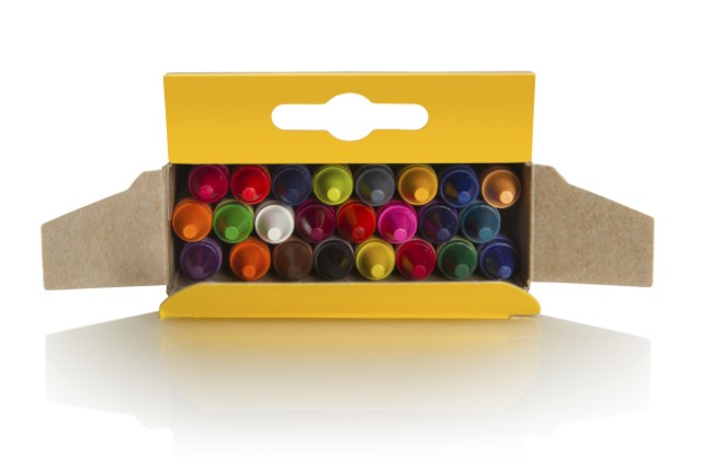 Overhead view of an open box of crayons