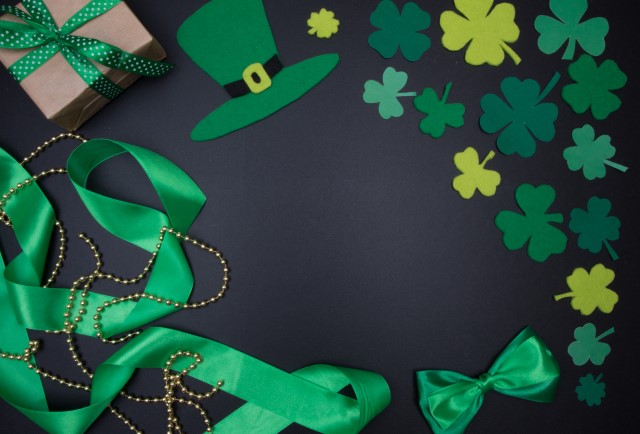 St Patrick's Day shamrocks, green ribbons, leprechaun hat, green beads, present
