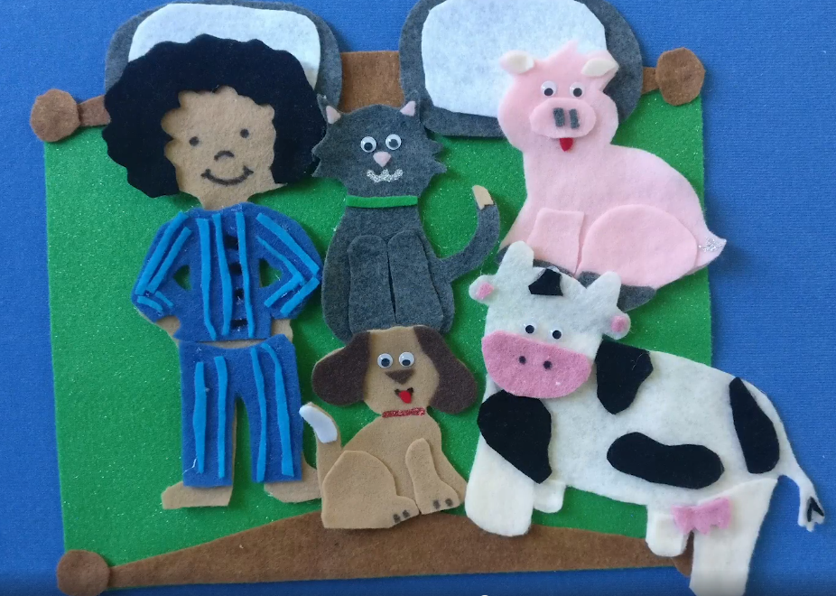 Photo of felt board with boy and animals