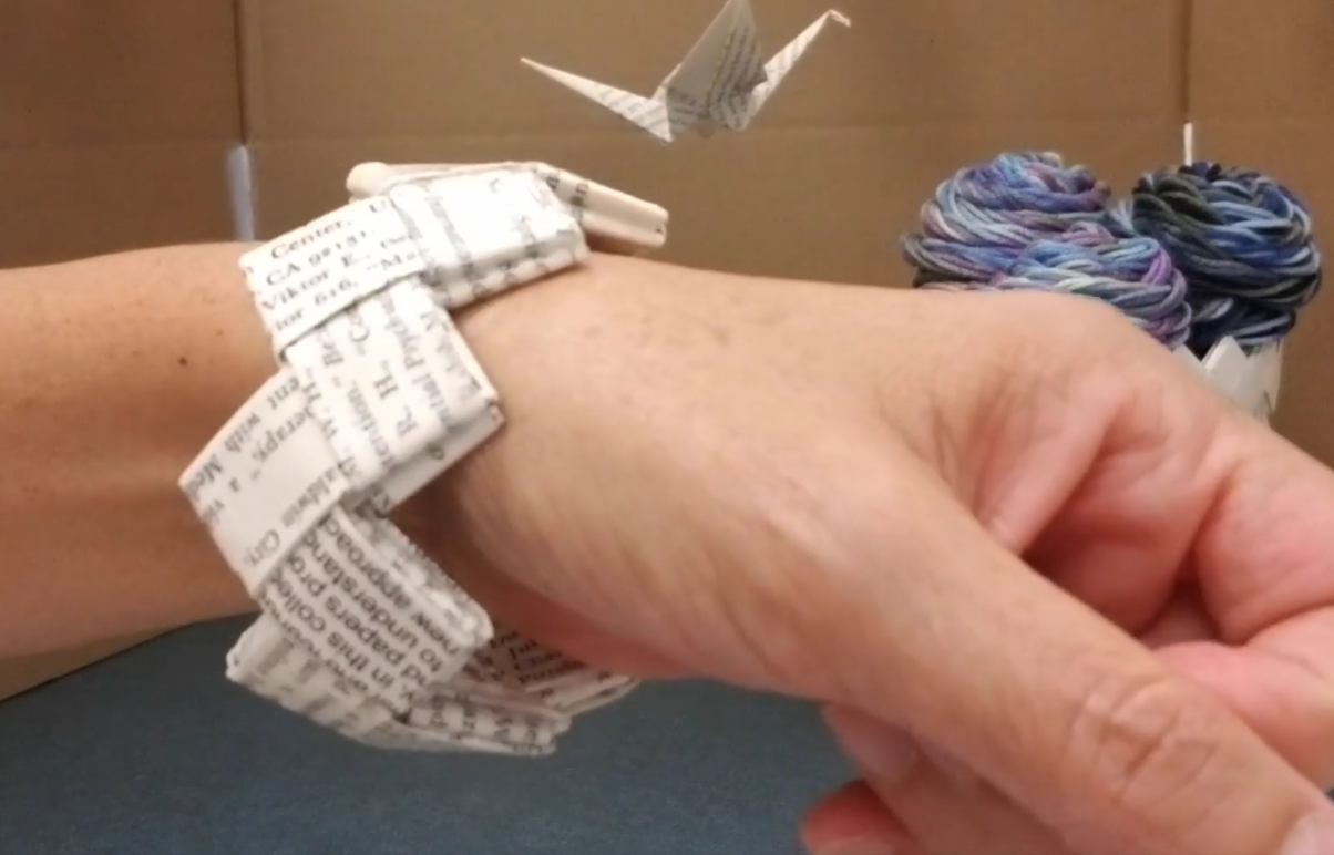 Wrist with paper bracelet