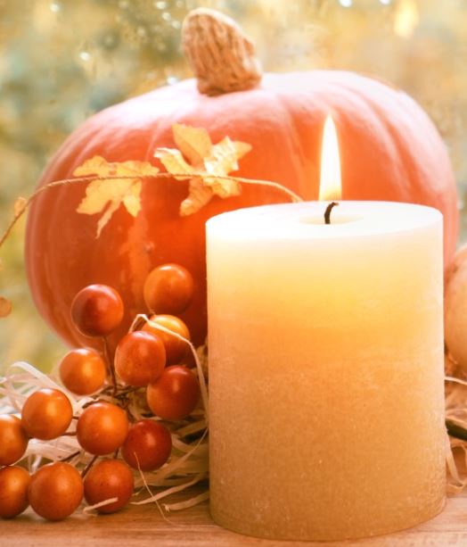 Autumn Still Life with Pumpkin Candle and Berries