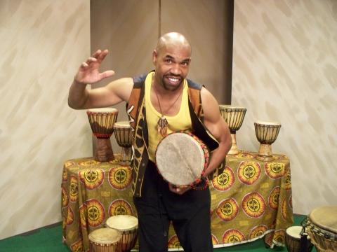 CHAZZ Ross smiling and ready to strike an African drum