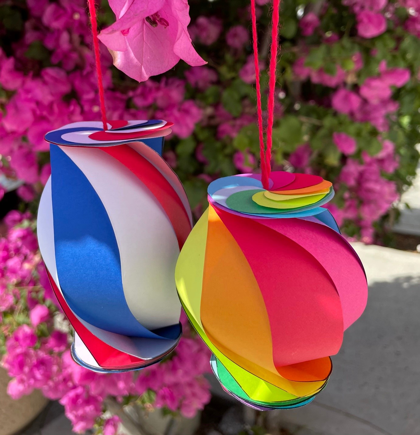 Colorful paper decorations, hanging from a tree