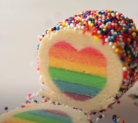 Rainbow Sugar Cookie with rainbow heart & rainbow sprinkles examples for the children's create program!