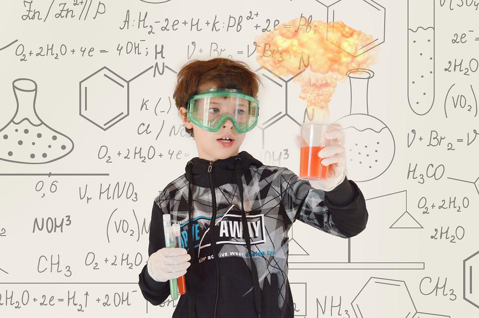 kid doing science