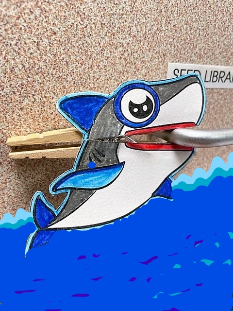 paper shark glued to clothespin