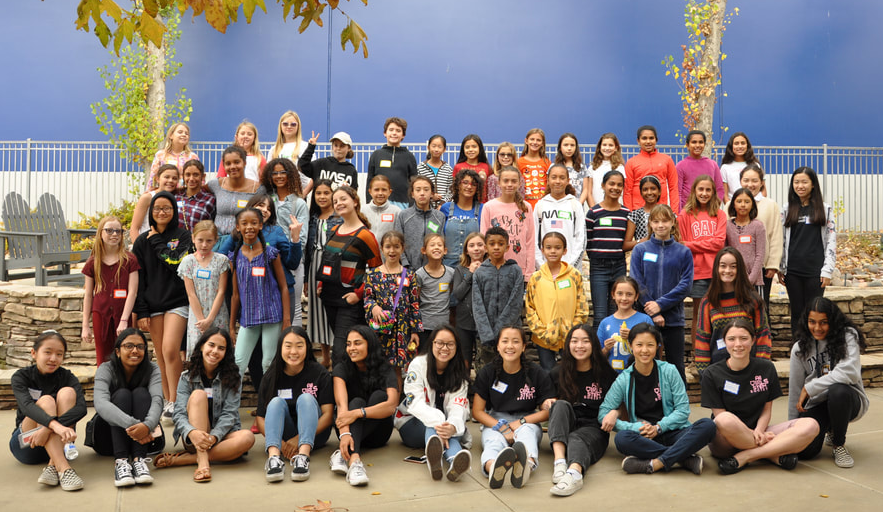 All Girls STEM attendees and teachers posing for picture