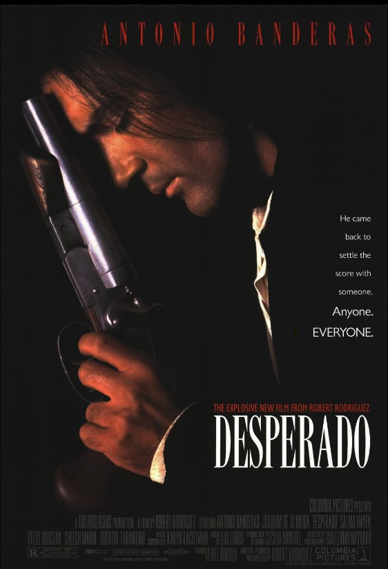 Poster for "Desperado," with a man resting his head on a gun