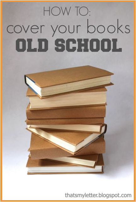 Stack of books covered with brown paper bags - old school style