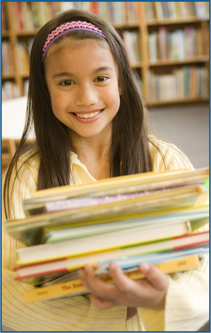 Dark haired girl with pile of books in her arms