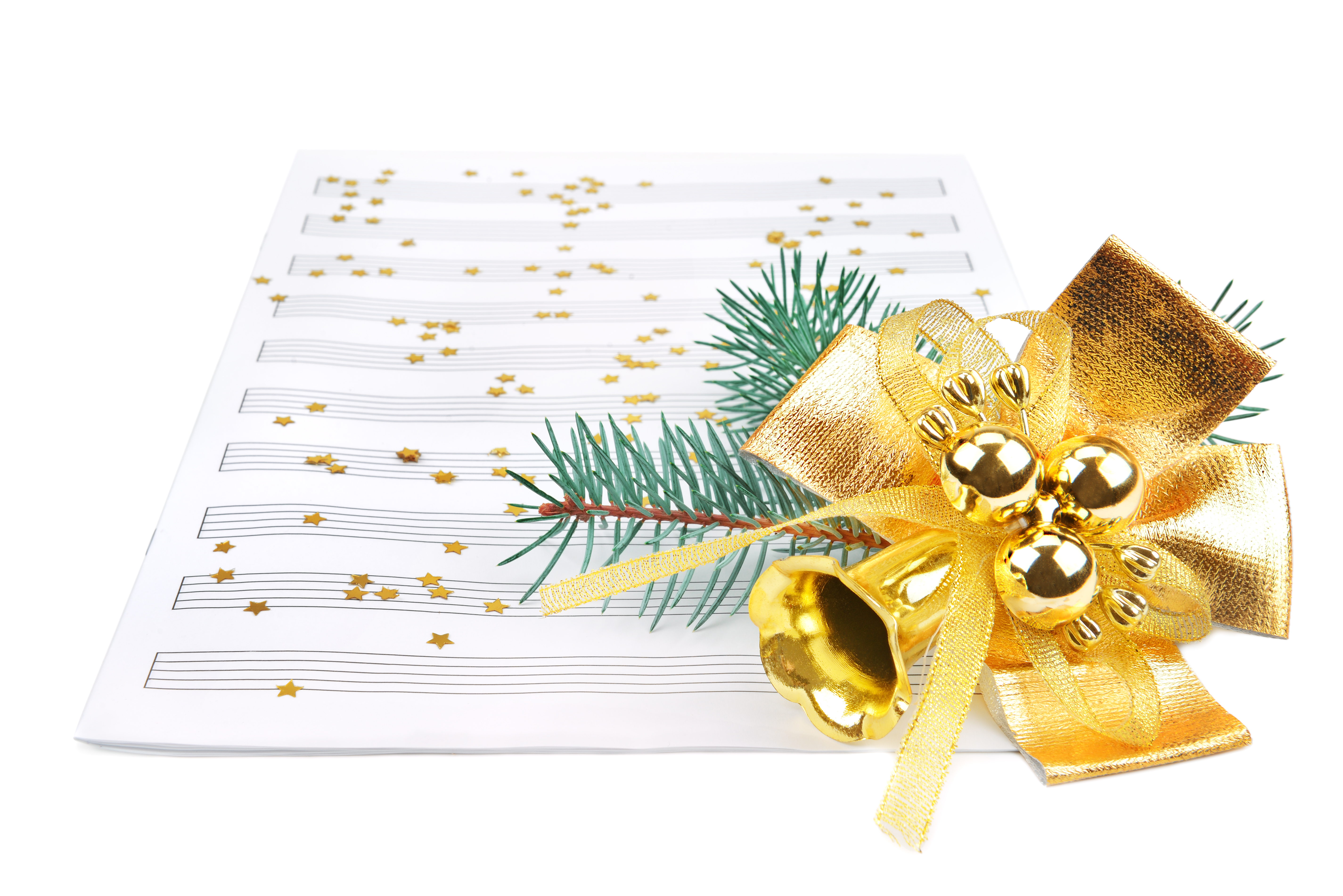 Image of sheet music with small gold stars scattered on it plus a gold bow and some greenery