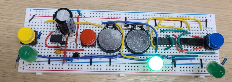 Breadboard with wires and LEDs to create a reaction game