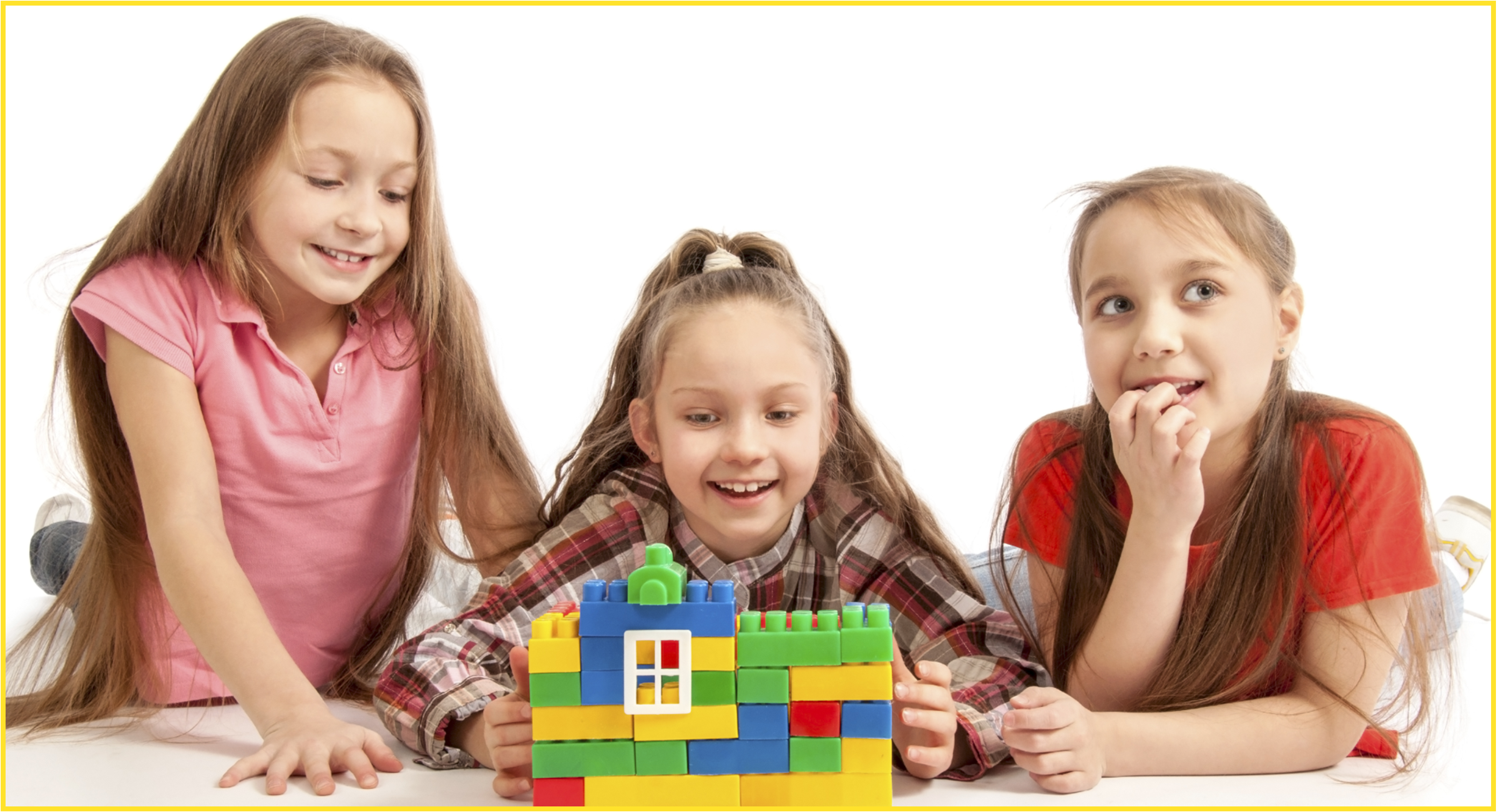 Three girls playing with Legos