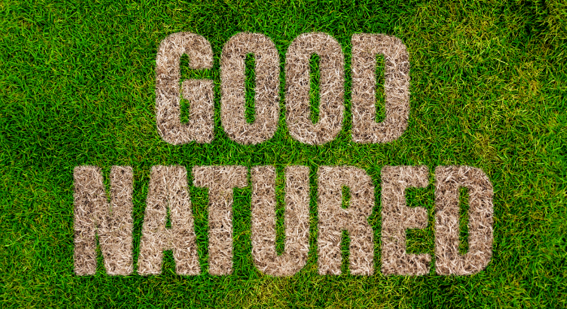 Image of green grass background with brown, dead grass spelling out the words "Good Natured"