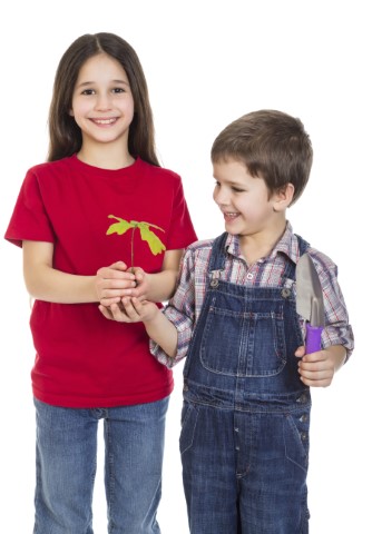 kids with oak sapling in hands