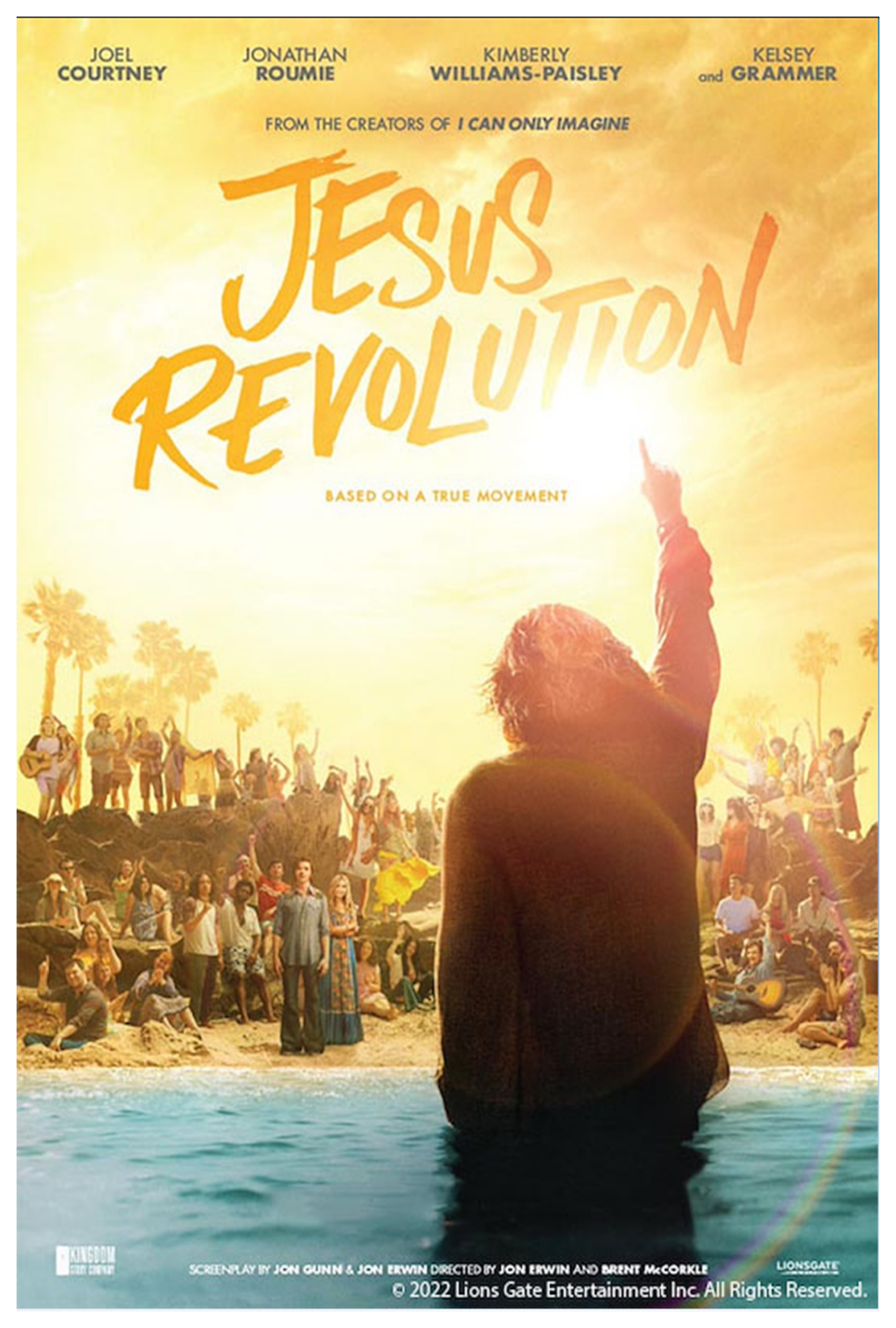Film poster featuring a main with a raised fist standing before a  crowd.