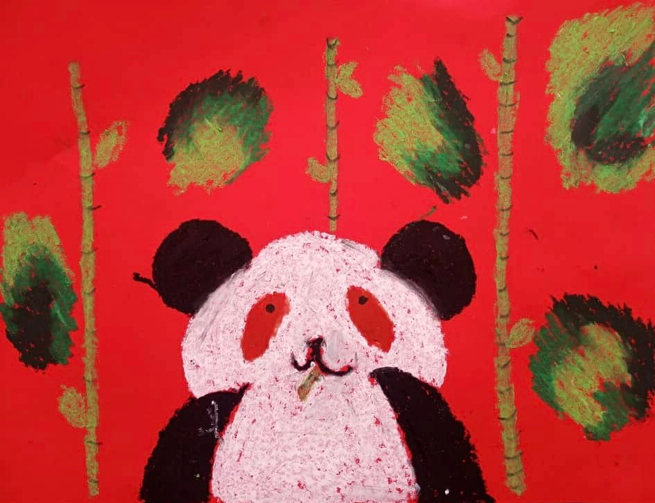 Oil Pastel drawing of panda bear with a red background.