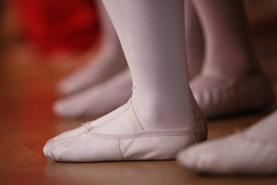 ballet shoes on feet