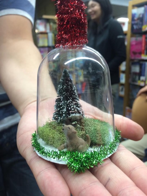 bell jar ornament in somebody's hand