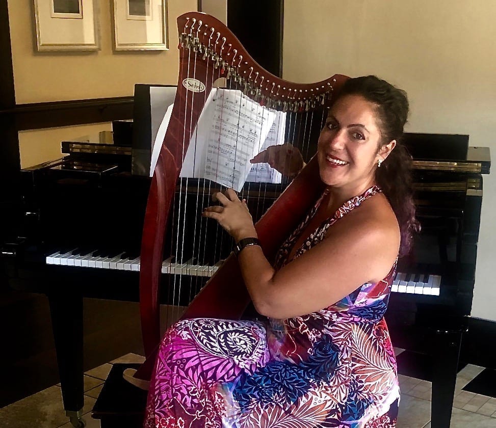Musician Chiara Capobianco with her harp
