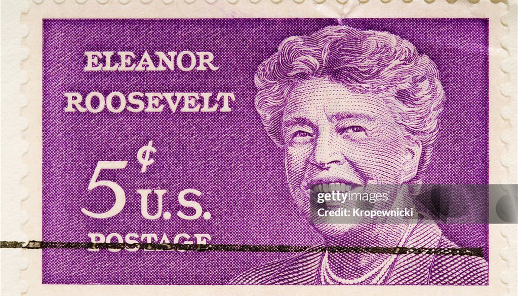Eleanor Roosevelt on a stamp with purple backgroud