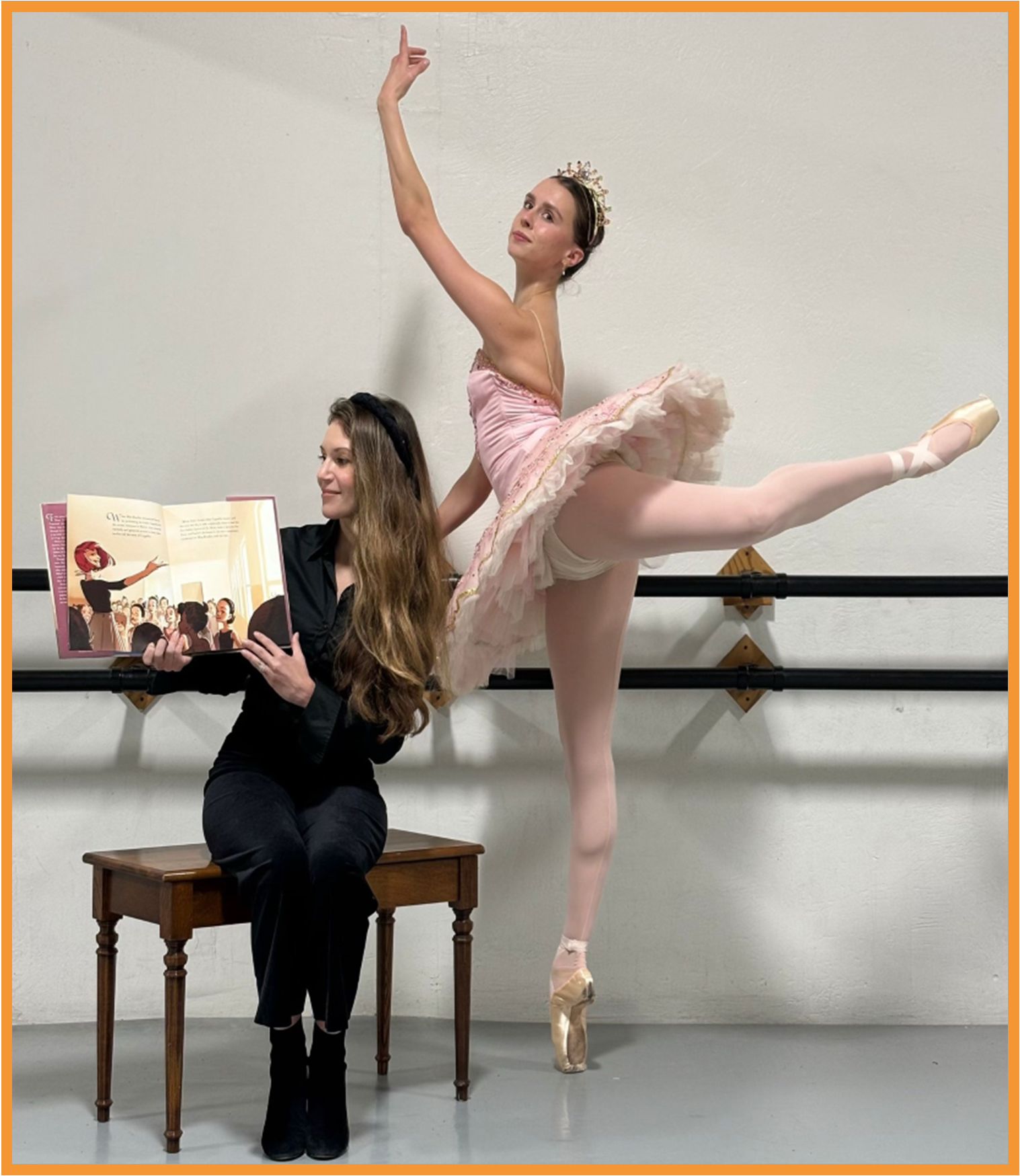 photo of librarian reading a story with a ballerina on a ballet bar behind her