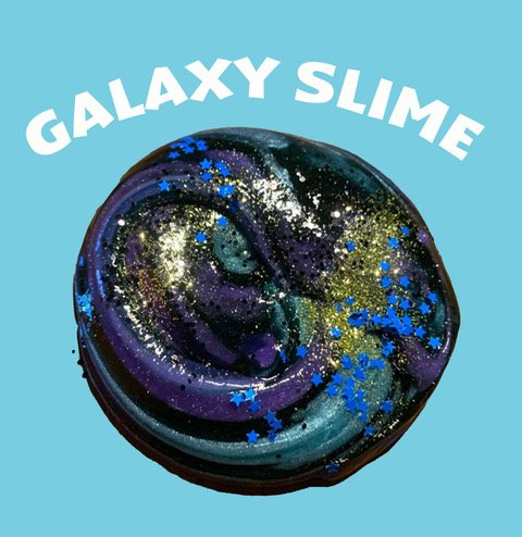 A photo on a sky blue background, a blob of multi-colored slime is in the middle of the image. 