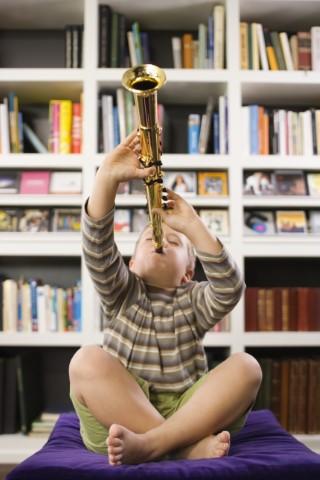 Picture of Boy playing a clarinet.  