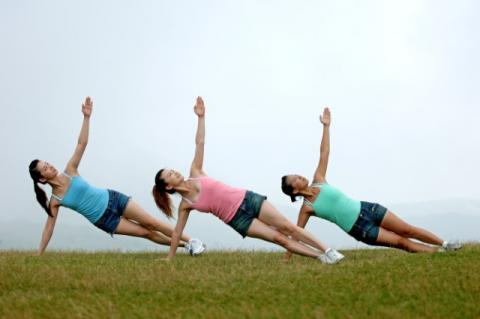 women in yoga pose