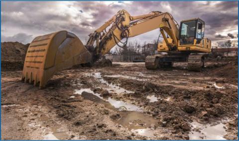 Construction vehicle in mud