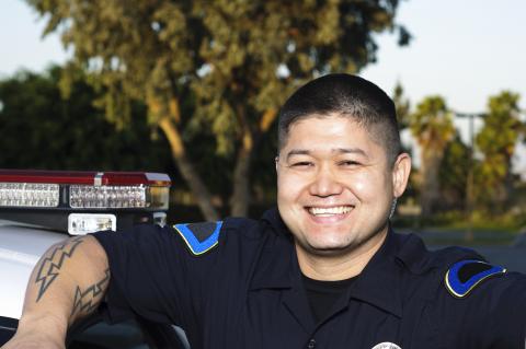 Police officer by car