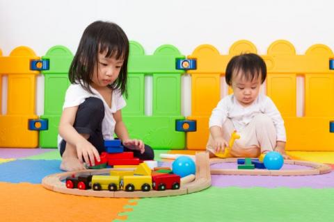 Babies/Toddlers playing with toys
