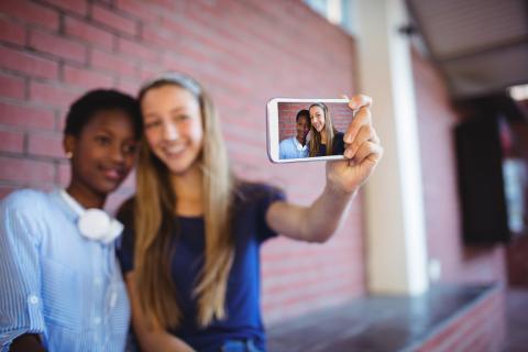 Two girls taking a selfie