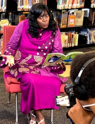 Storyteller reads book at the Central Library