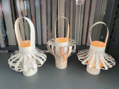 3 paper lanterns made from book pages
