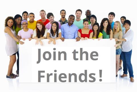 Photo of people surrounding a "Join the friends" sign.