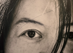 A close-up picture of an incarcerated woman’s eye by an artist from Poetic Justice.