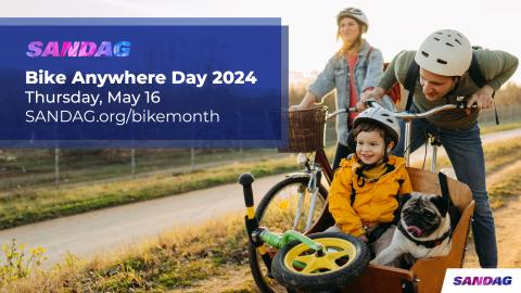Photo of a family on bikes, with the words "Bike Anywhere Day 2024""