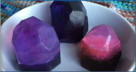 Three purple gem-style soaps
