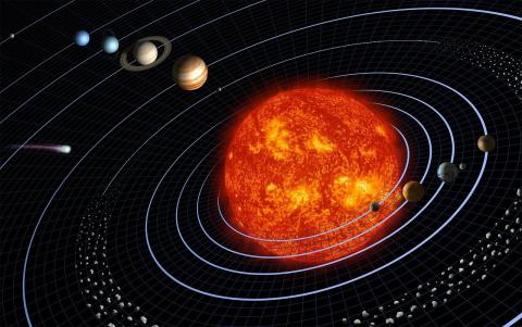 Image of our solar system with the sun and planets in orbit 