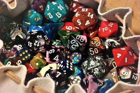 various colorful dice to play dungeons and dragons